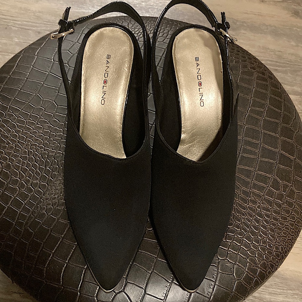 Black suede pointed toed heels. Used and only worn once!